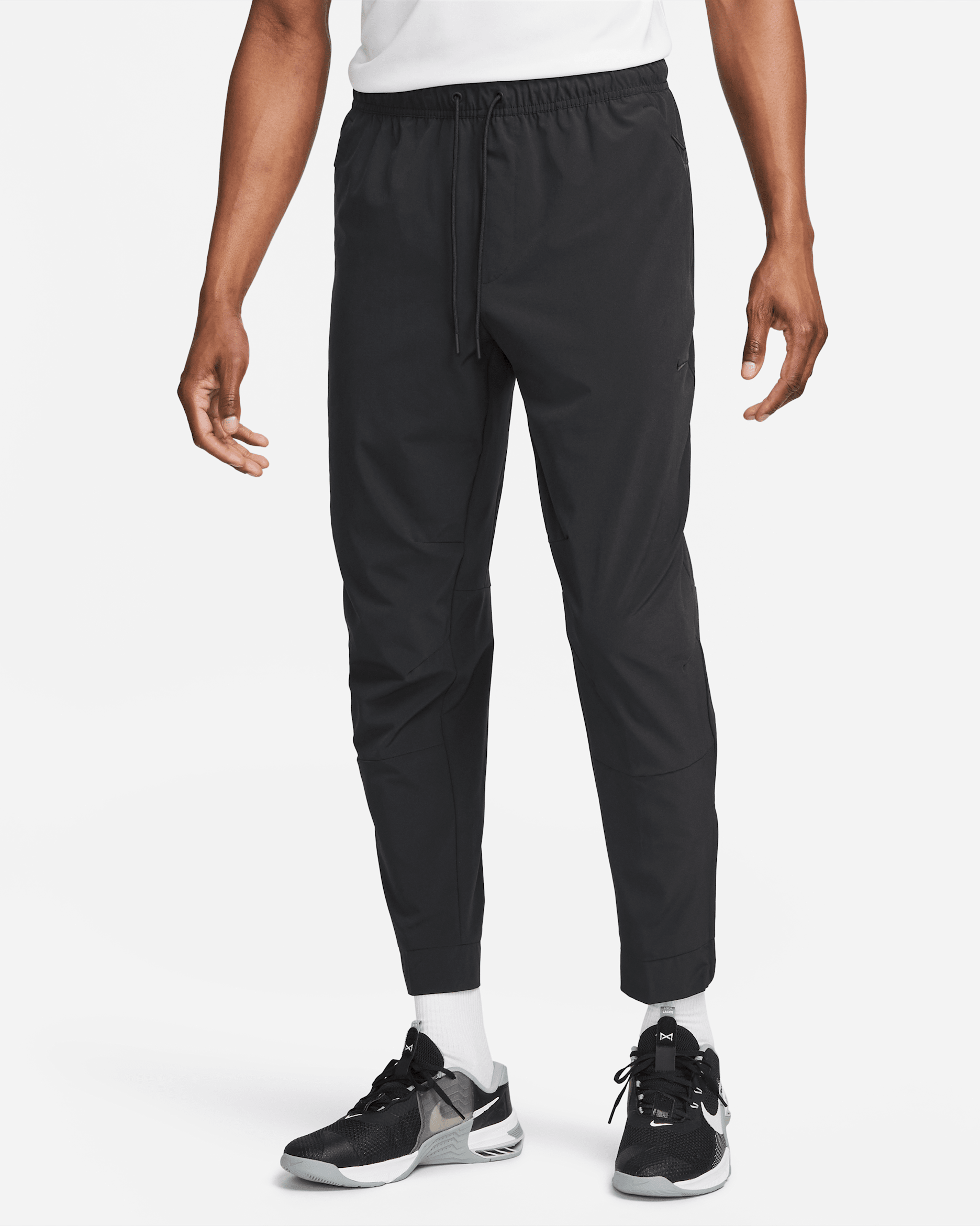 Nike Unlimited Men's Dri-FIT Zip Cuff Versatile Trousers. Nike IL